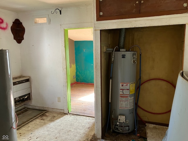 utility room with water heater