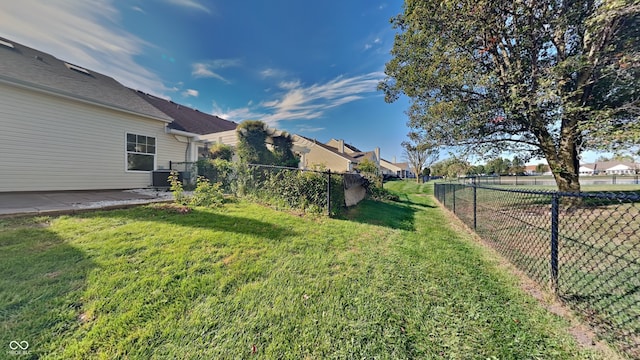 view of yard featuring central AC