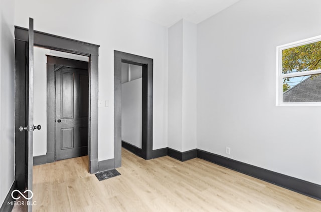 unfurnished bedroom featuring light hardwood / wood-style floors