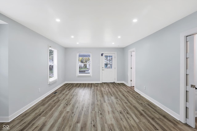 interior space with hardwood / wood-style flooring