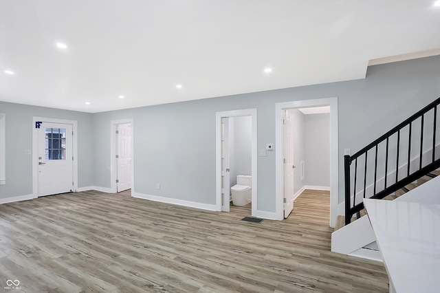 entryway with light wood-type flooring