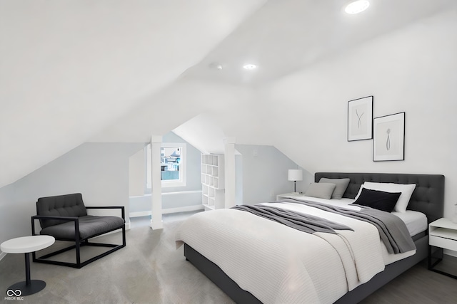 bedroom with lofted ceiling