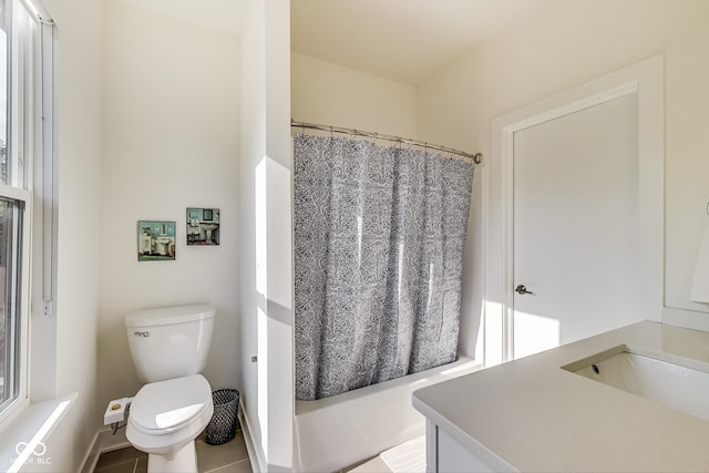 bathroom with vanity, curtained shower, toilet, and tile patterned floors