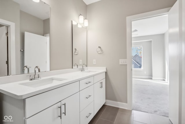 bathroom featuring vanity and tile patterned flooring