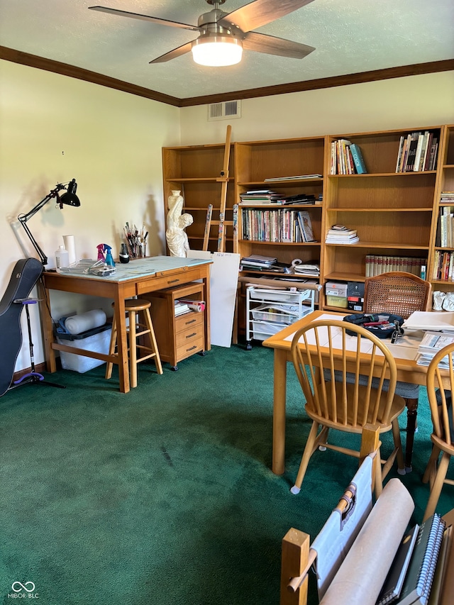 carpeted office space with ceiling fan, ornamental molding, and a textured ceiling