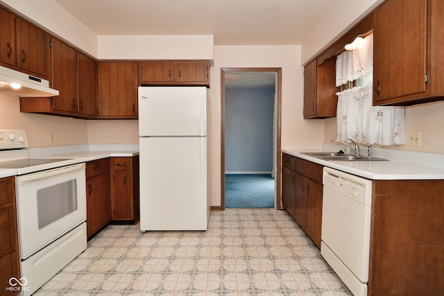 kitchen with white appliances and sink