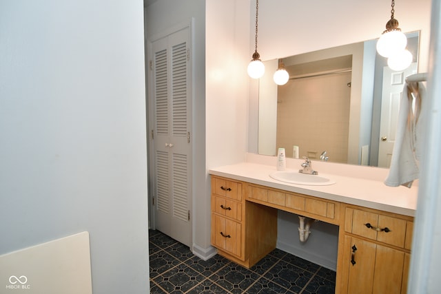 bathroom featuring vanity and tile patterned flooring