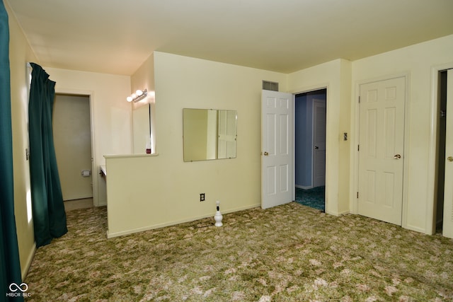 unfurnished bedroom with carpet