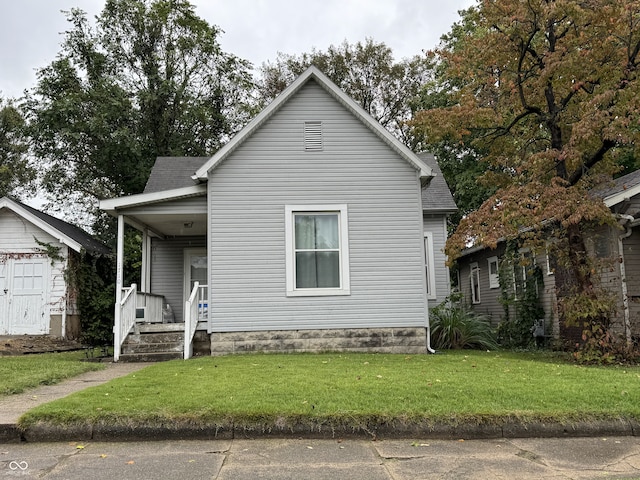 bungalow with a front lawn