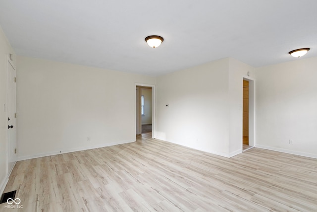 empty room featuring light hardwood / wood-style floors