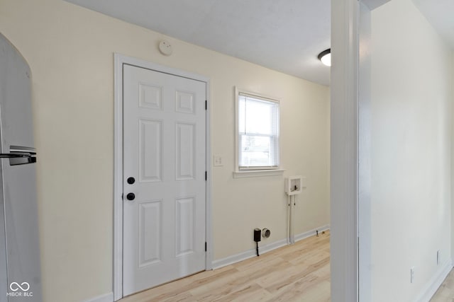 entrance foyer with light hardwood / wood-style floors