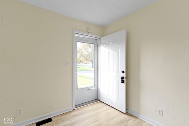 entrance foyer featuring light wood-type flooring