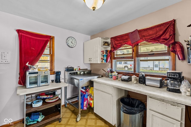 kitchen with white cabinets