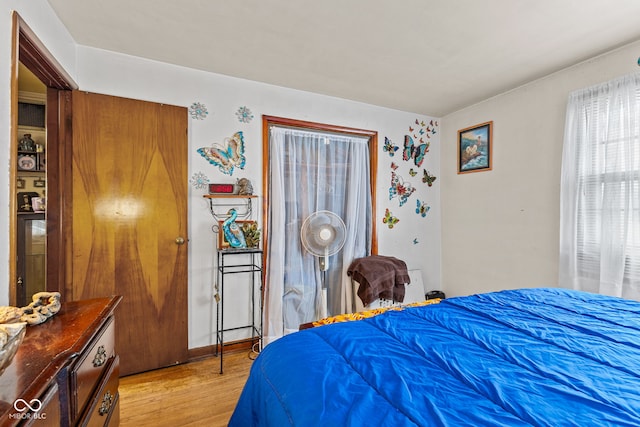 bedroom with light hardwood / wood-style floors