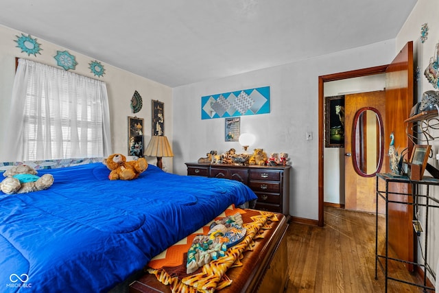 bedroom featuring wood-type flooring