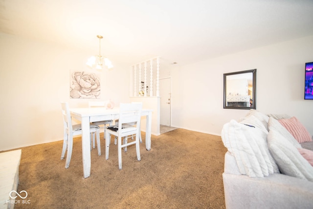 carpeted dining space with a chandelier