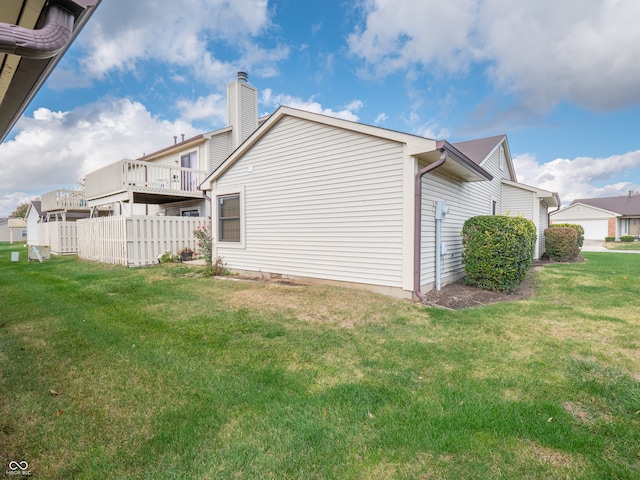 view of property exterior featuring a yard