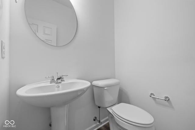 bathroom with sink and toilet