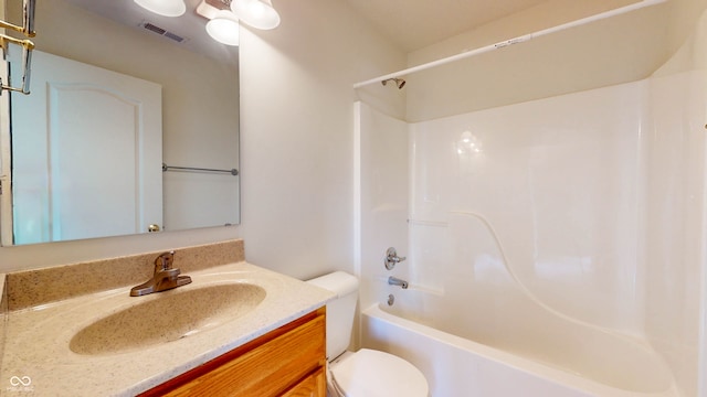 full bathroom with vanity, toilet, and shower / washtub combination