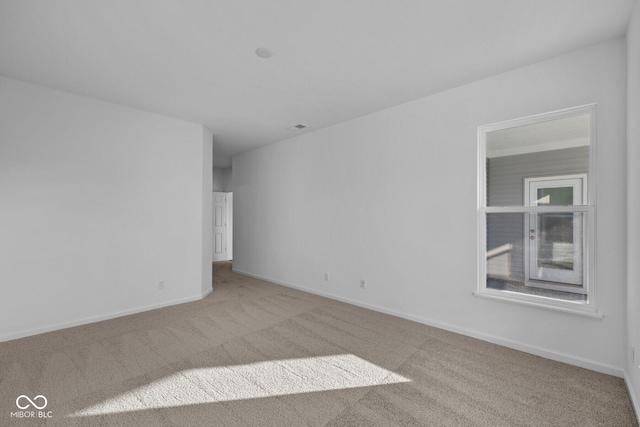 10549 Maidenhair Dr, Indianapolis, IN 46239 - unfurnished room with carpet flooring and baseboards