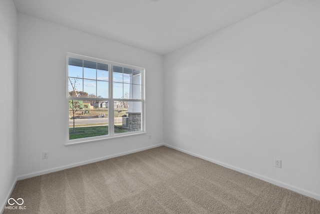 10549 Maidenhair Dr, Indianapolis, IN 46239 - carpeted spare room featuring baseboards