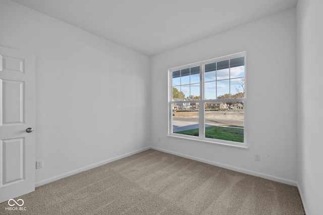 view of carpeted spare room