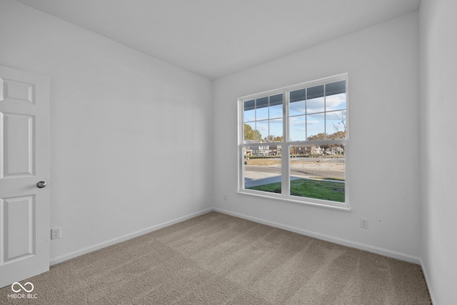 10549 Maidenhair Dr, Indianapolis, IN 46239 - carpeted spare room with baseboards