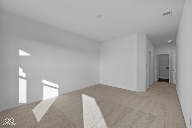 10549 Maidenhair Dr, Indianapolis, IN 46239 - carpeted spare room with baseboards and recessed lighting