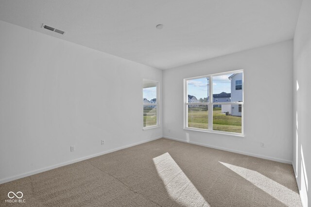 10549 Maidenhair Dr, Indianapolis, IN 46239 - unfurnished room with carpet flooring and baseboards