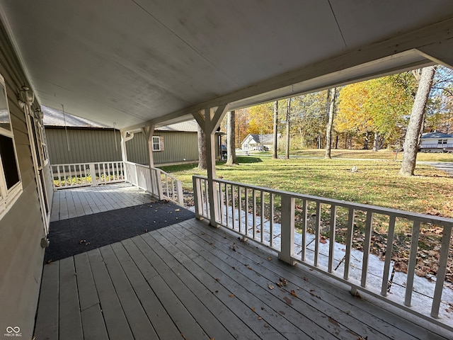 deck featuring a yard