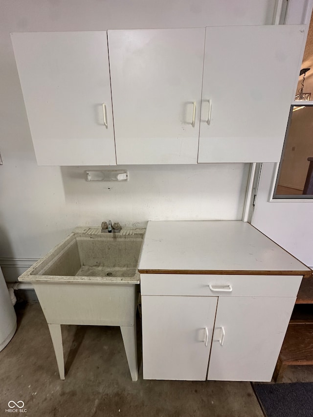 kitchen featuring white cabinetry