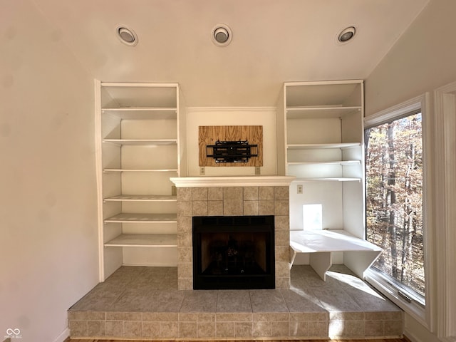 unfurnished living room with a fireplace