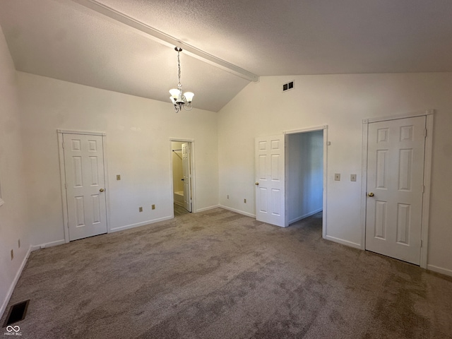 unfurnished bedroom featuring a chandelier, vaulted ceiling with beams, and carpet floors