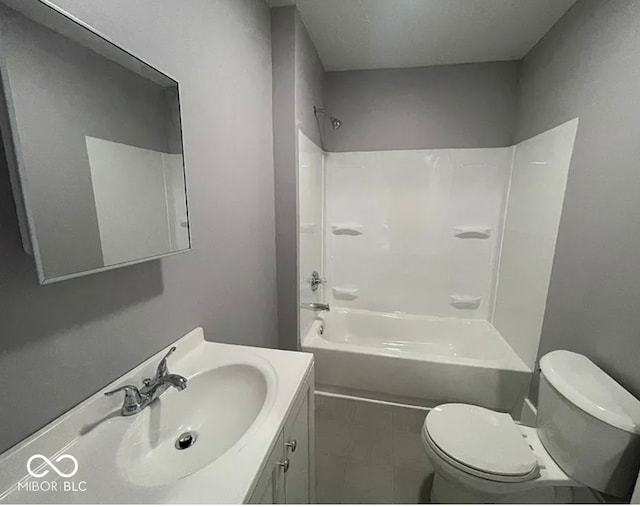 full bathroom with vanity, bathing tub / shower combination, and toilet