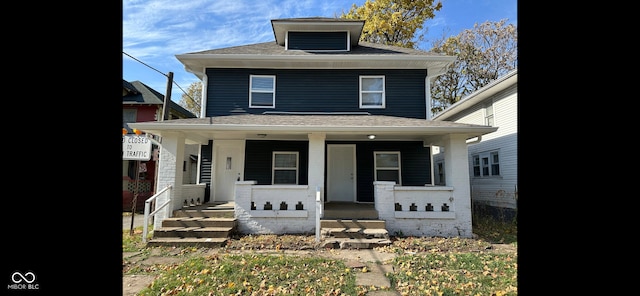 front of property featuring a porch