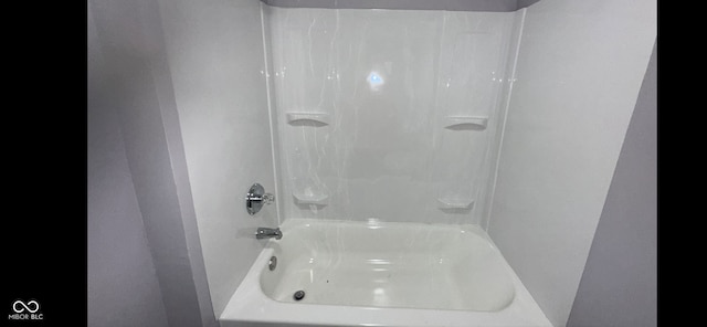 bathroom featuring washtub / shower combination