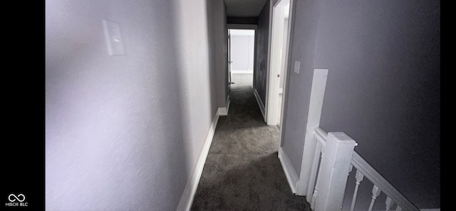 hall with dark carpet