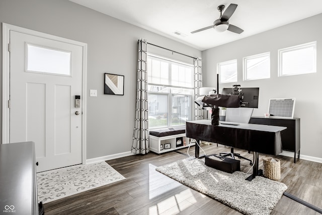 foyer featuring ceiling fan and dark hardwood / wood-style flooring