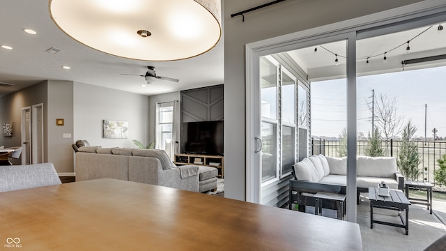 dining room featuring ceiling fan