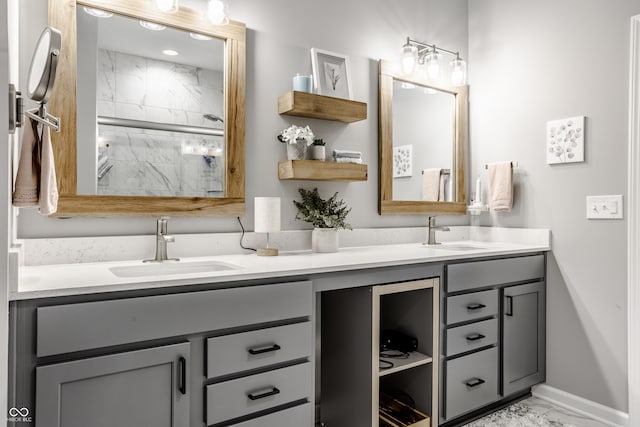 bathroom with vanity and an enclosed shower