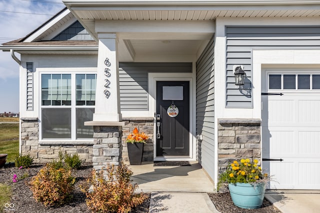 entrance to property with a garage