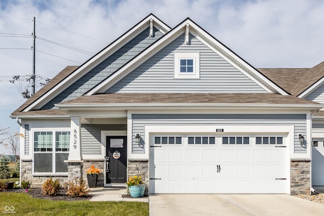 craftsman-style house with a garage