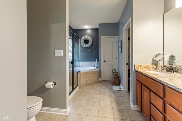 full bathroom featuring tile patterned flooring, vanity, toilet, and shower with separate bathtub