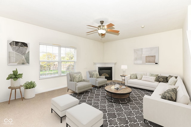 living room with carpet and ceiling fan