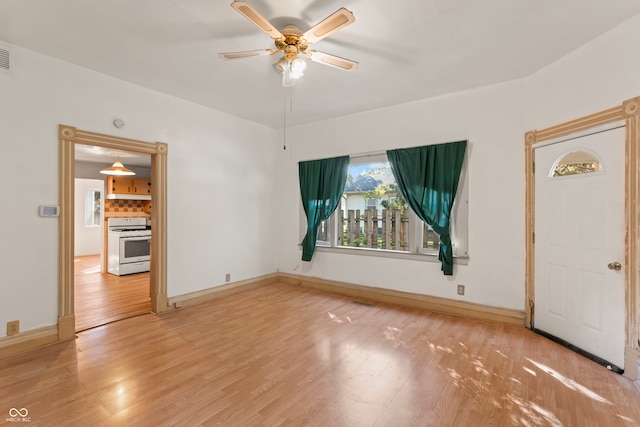 interior space featuring ceiling fan and hardwood / wood-style flooring