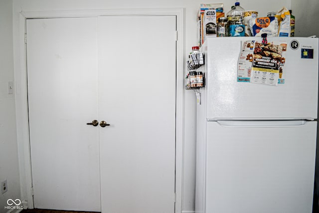 kitchen featuring white fridge