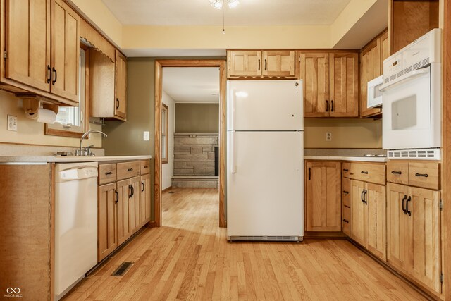 5861 S 100 W, Fountaintown, IN 46130 - kitchen featuring white appliances, light countertops, and light wood finished floors