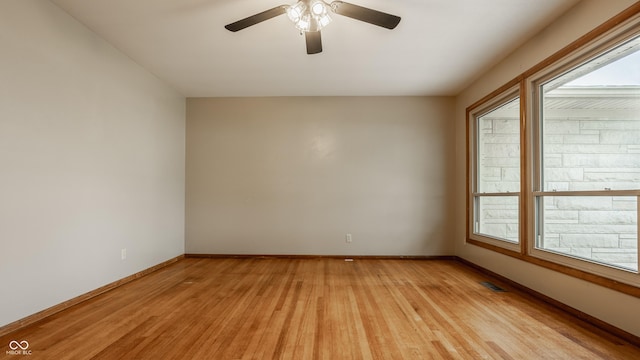 5861 S 100 W, Fountaintown, IN 46130 - unfurnished room featuring light wood-style flooring, baseboards, and ceiling fan
