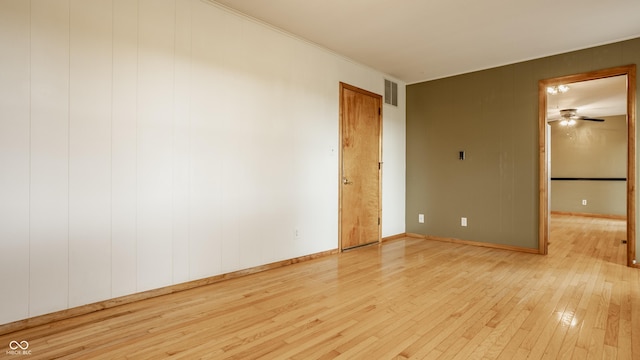 5861 S 100 W, Fountaintown, IN 46130 - empty room featuring hardwood / wood-style floors, a ceiling fan, baseboards, and crown molding