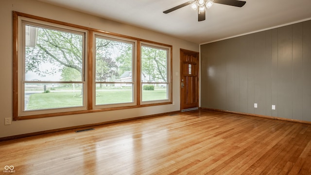 5861 S 100 W, Fountaintown, IN 46130 - unfurnished room featuring light wood-style floors, ceiling fan, and baseboards